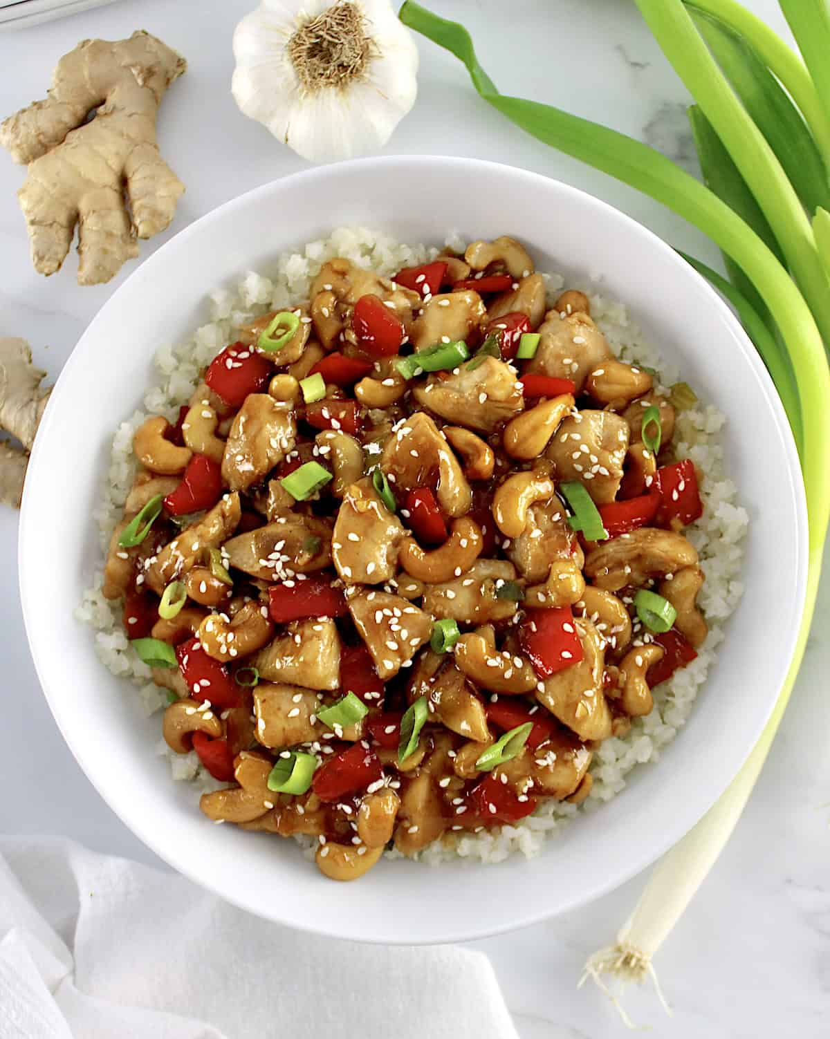 overhead view of Cashew Chicken in white bowl