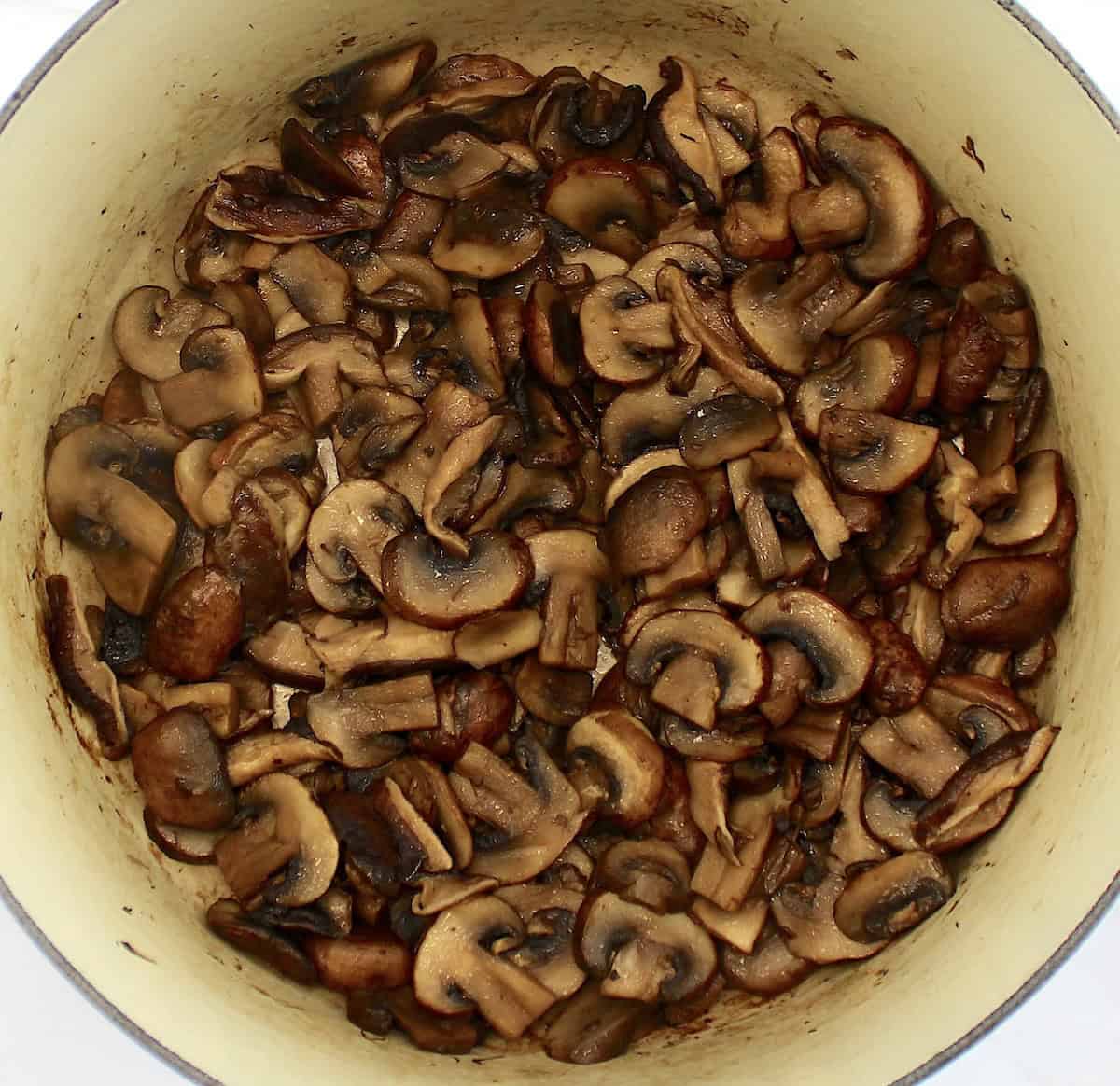 cooked sliced mushrooms in dutch oven