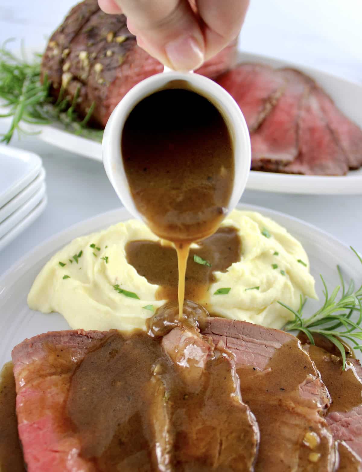 Roast Beef with Gravy being poured over top