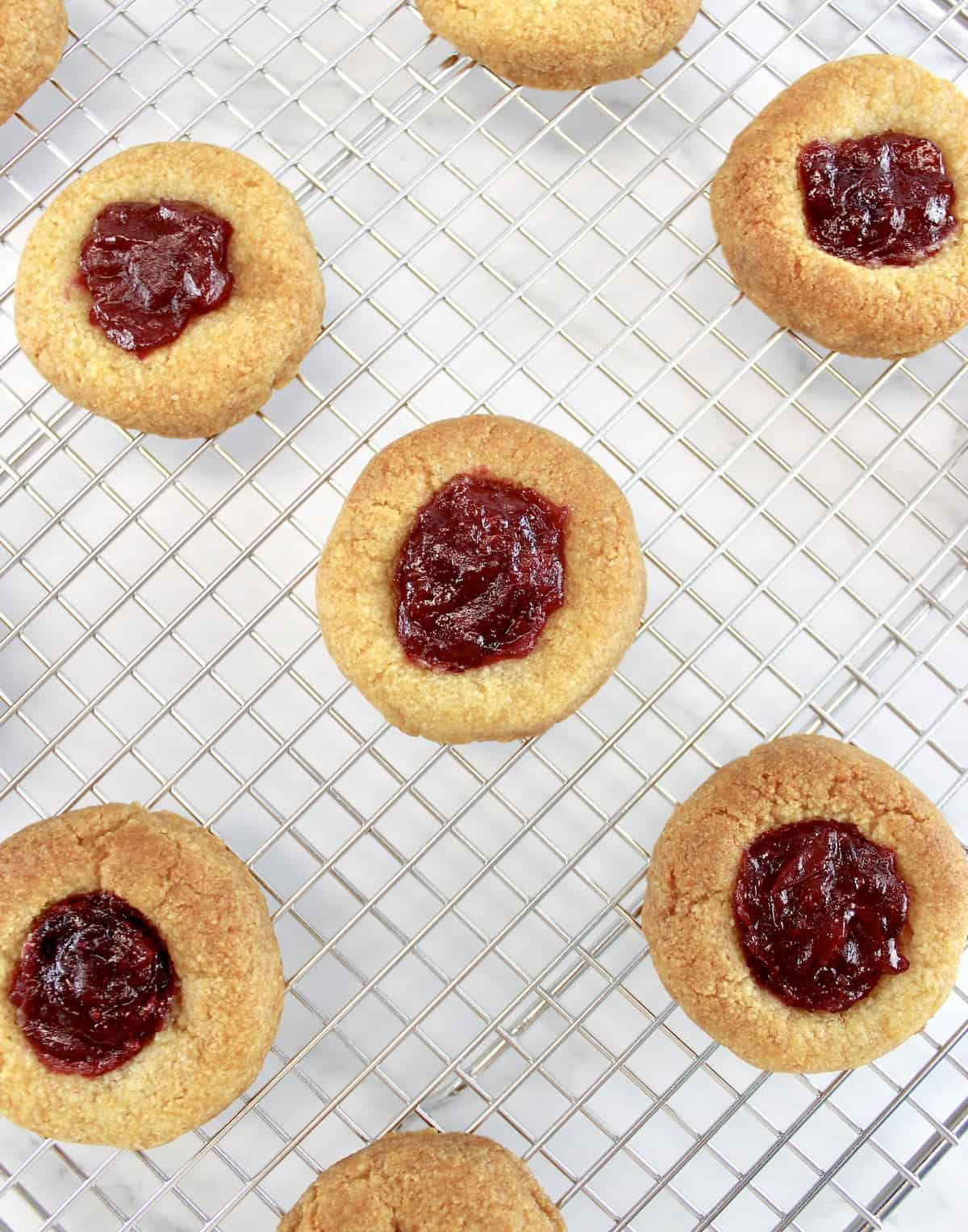 Cranberry Thumbprint Cookies on cooking rack