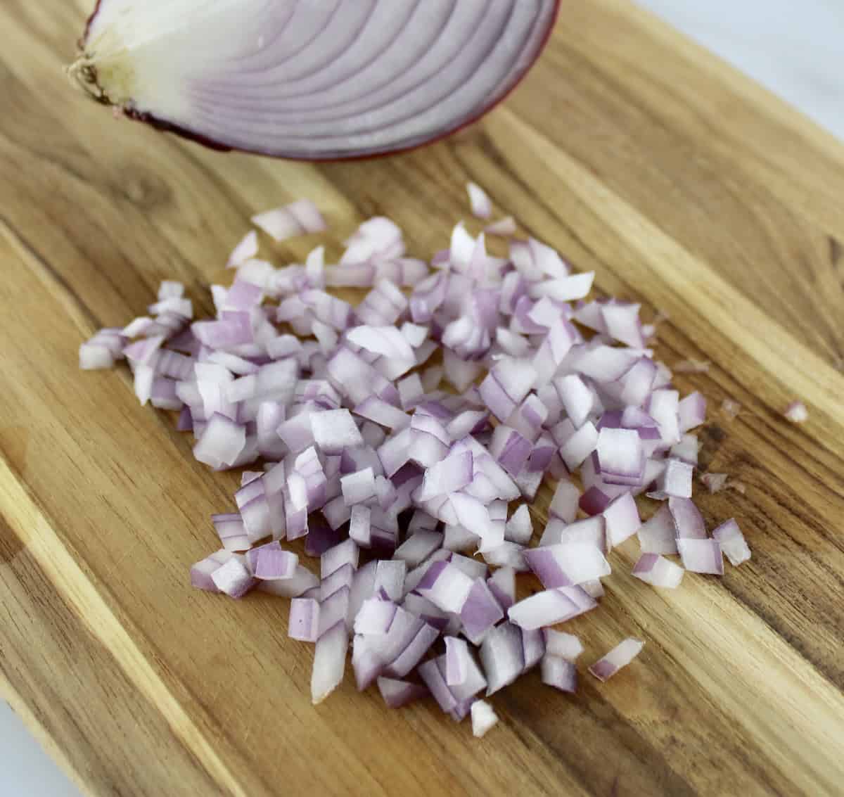 minced red onion on cutting board