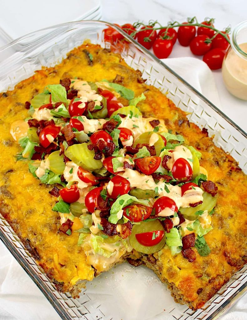 closeup of Bacon Cheeseburger Casserole with slice missing