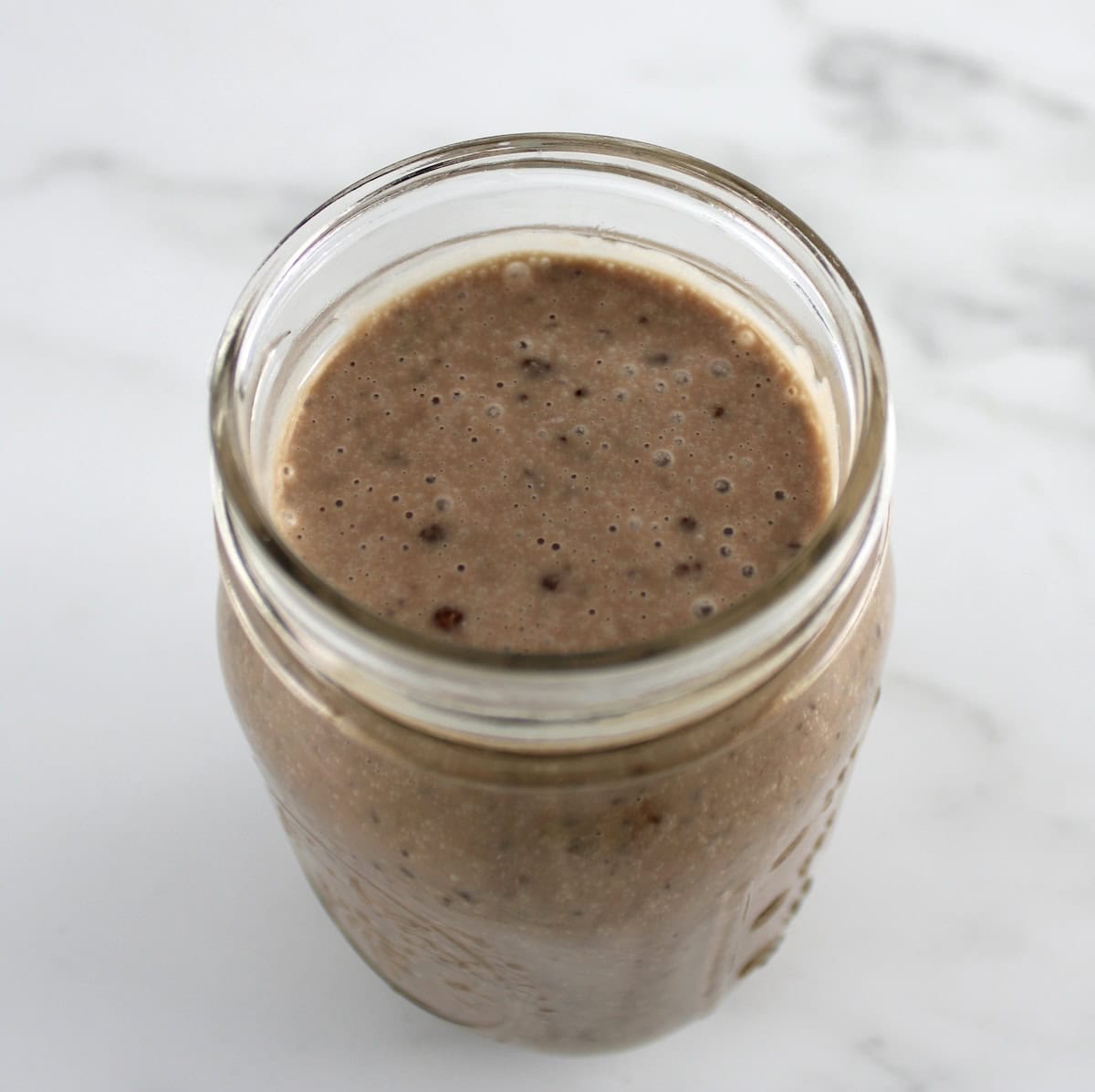 Chocolate Chia Seed Pudding in open mason jar