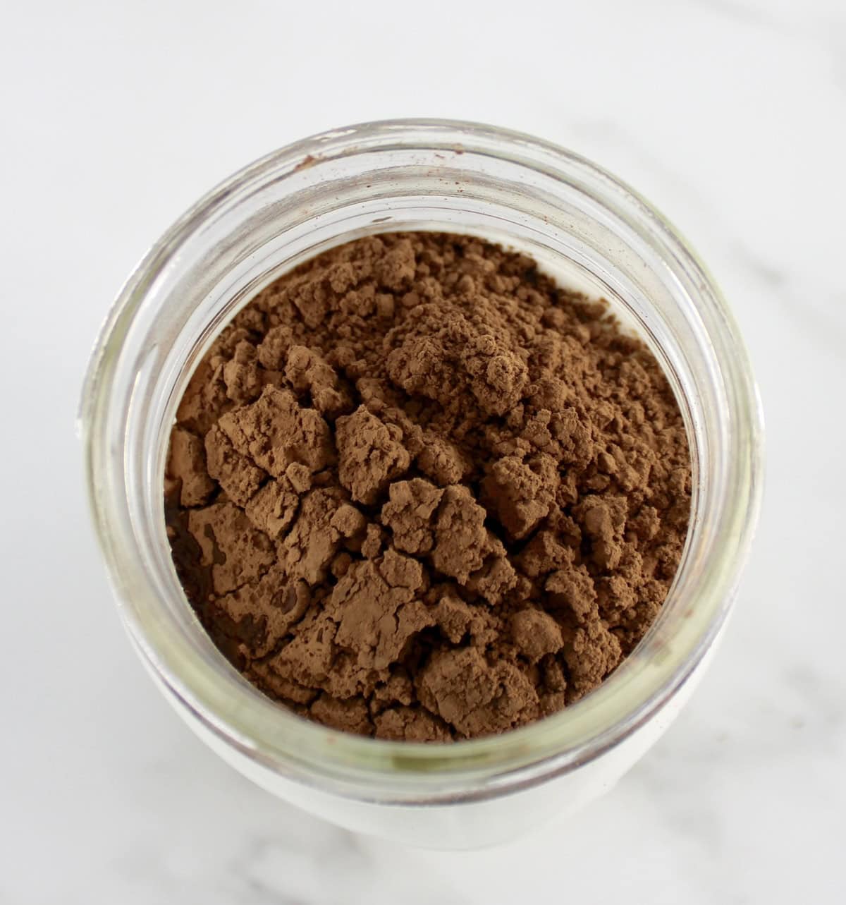 cocoa powder in open mason jar