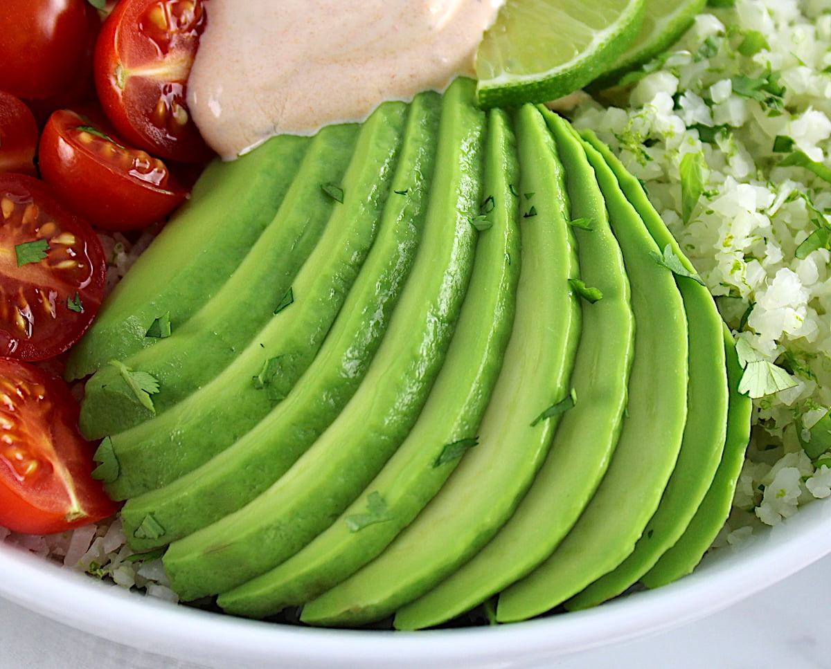 closeup of sliced avocado in Keto Burrito Bowl