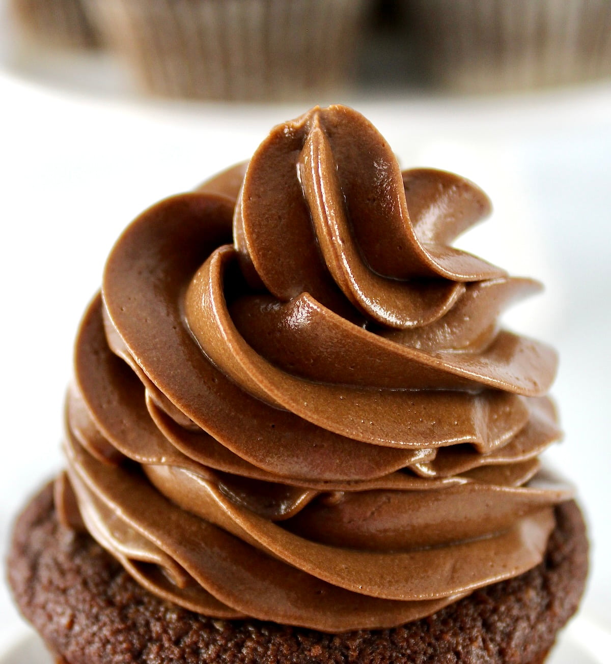 closeup of Keto Chocolate Frosting on cupcake