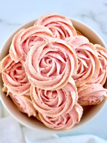 Keto Strawberry Meringue Cookies piled up in white bowl