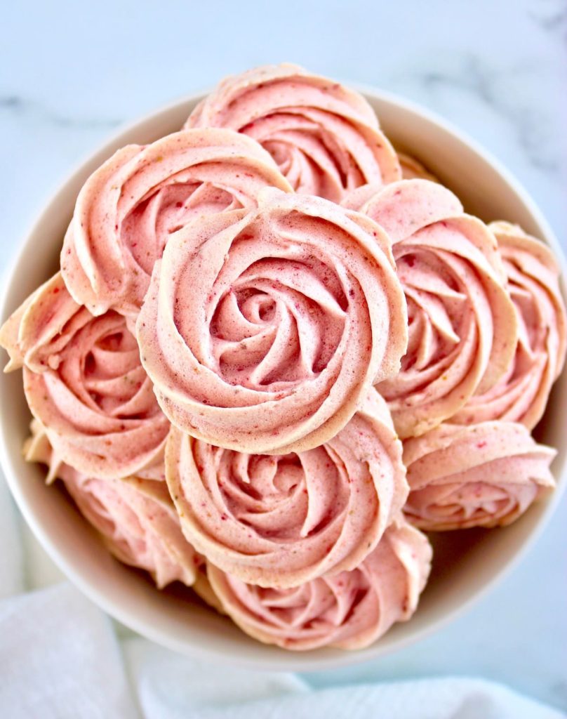 Keto Strawberry Meringue Cookies piled up in white bowl