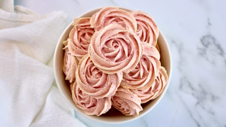 Keto Strawberry Meringue Cookies piled up in white bowl
