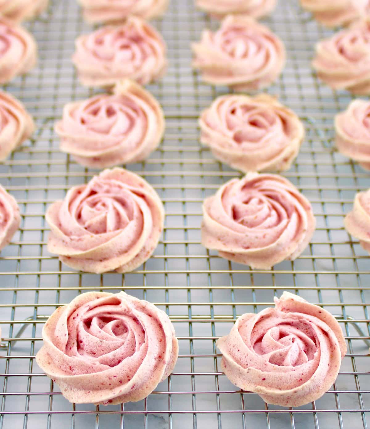 Keto Strawberry Meringue Cookies on cooling rack