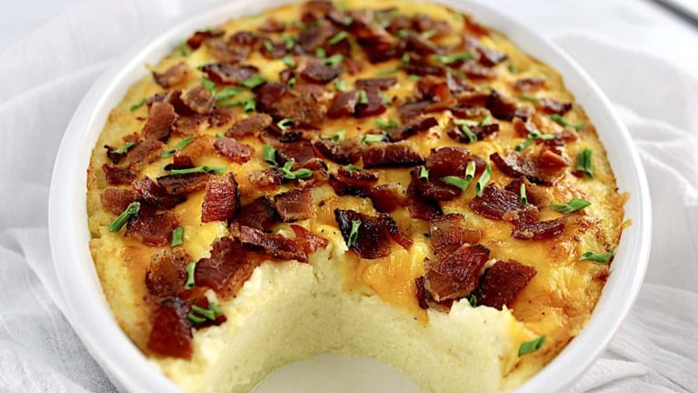 Creamy cauliflower casserole in a white baking dish