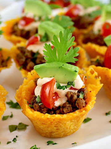 Mini Taco Bites on white platter with cilantro garnish