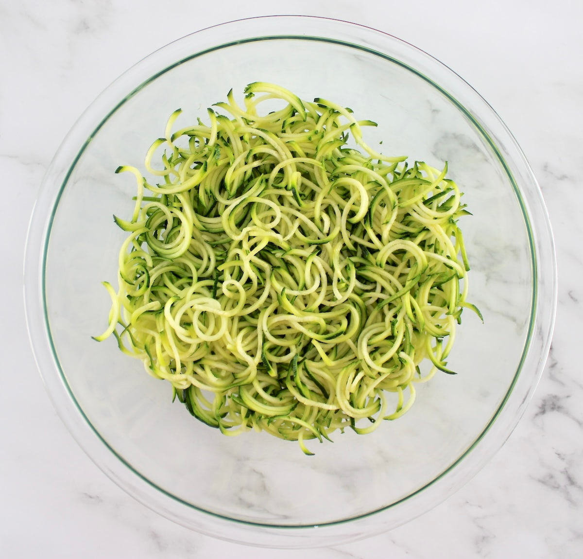 zucchini noodles in glass bowl