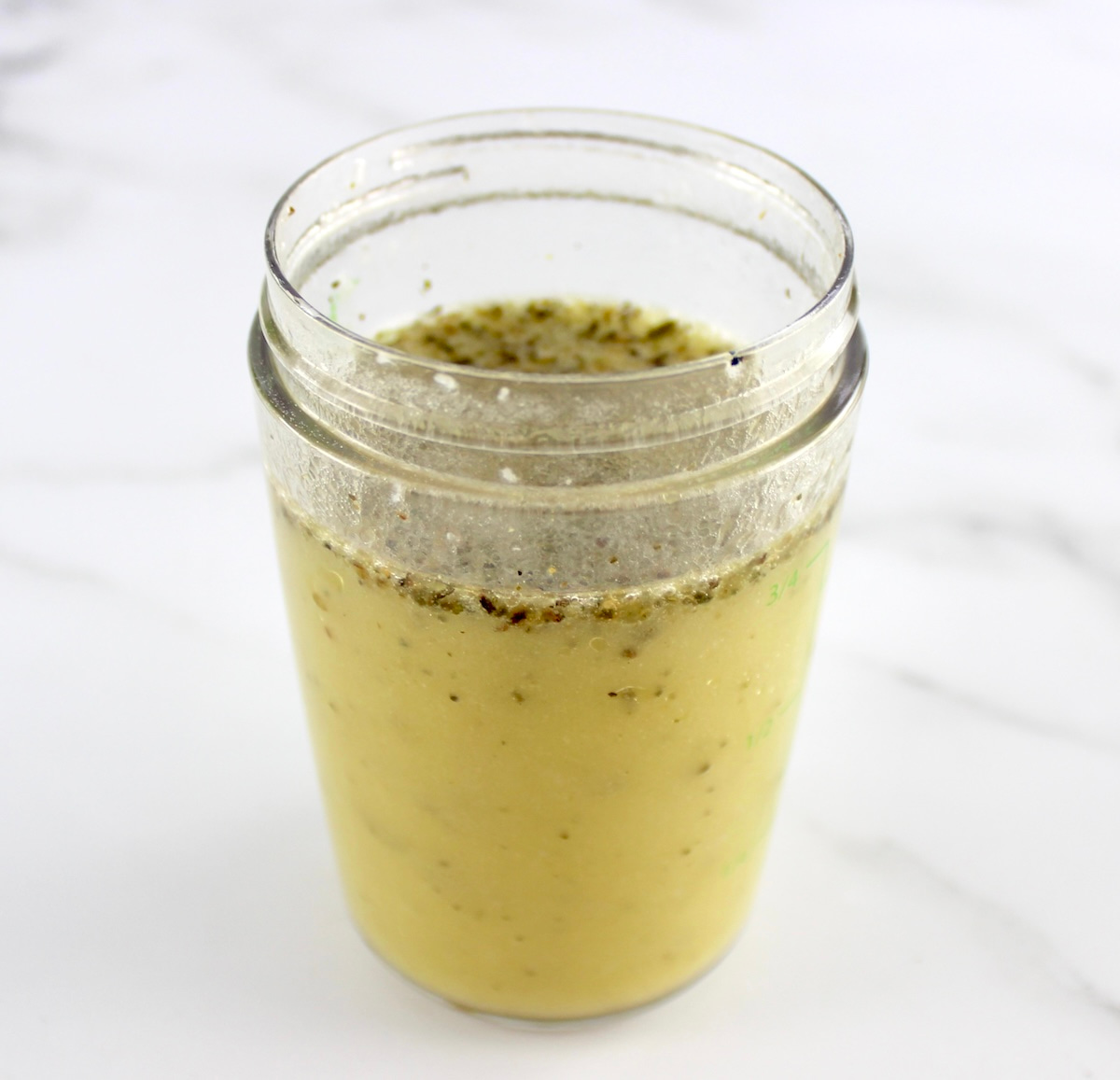 Zucchini Noodle Pasta Salad dressing in dressing shaker