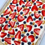 Frozen Yogurt Berry Bark on parchment paper cut into pieces