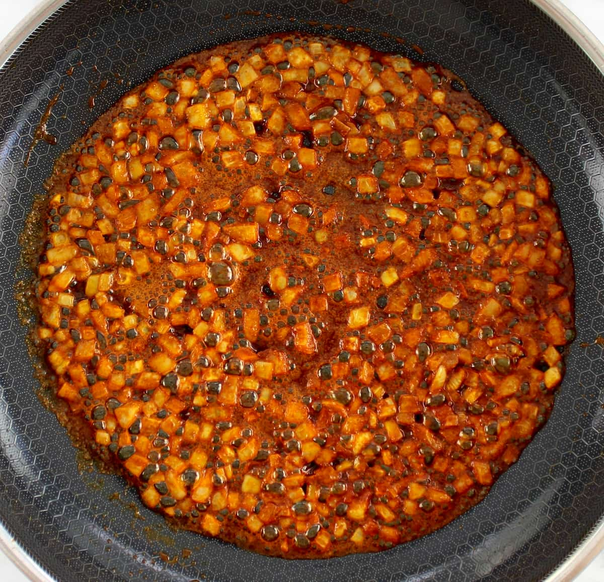 onions, butter and spices in skillet