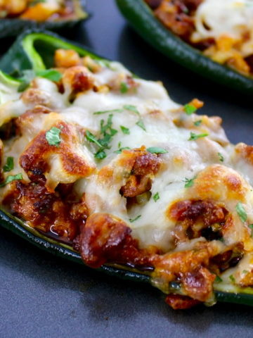 closeup of Stuffed Poblano Peppers on baking sheet
