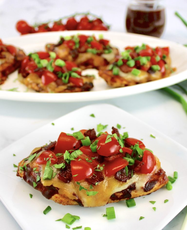 Monterey Chicken on white plate with more in back