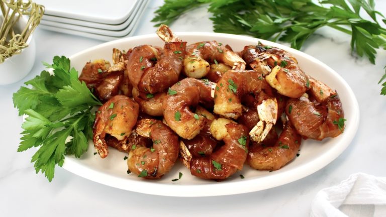 Air Fryer Prosciutto Wrapped Shrimp on white oval platter