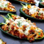 Keto Stuffed Poblano Peppers on baking sheet