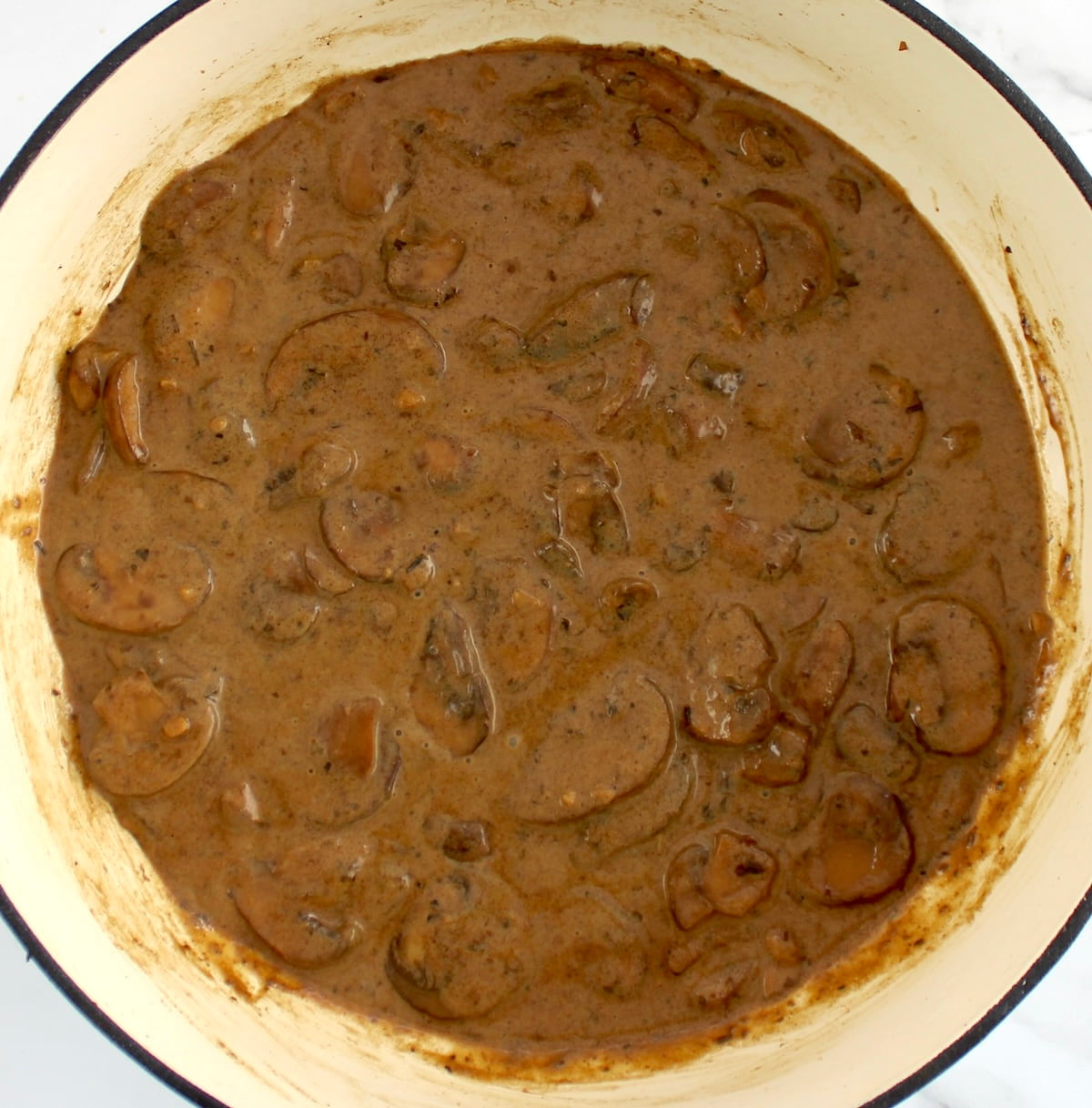 mushrooms with gravy in skillet