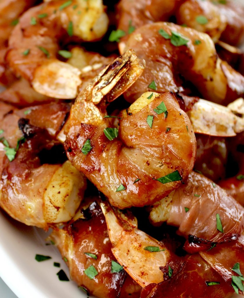 Air Fryer Prosciutto Wrapped Shrimp on white oval platter