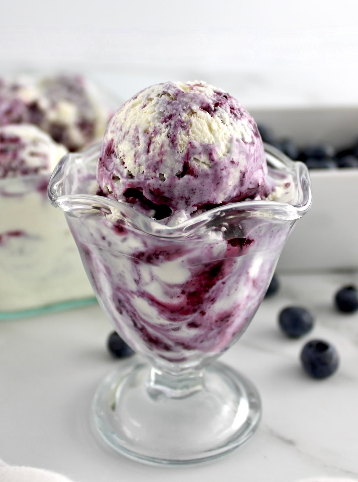 closeup side view of Blueberry Vanilla Swirl Ice Cream in glass