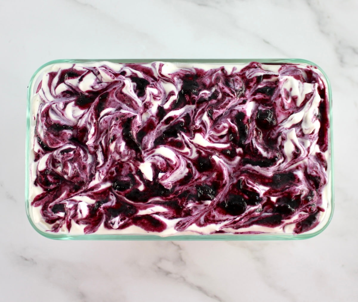 Blueberry Vanilla Swirl Ice Cream in glass loaf pan
