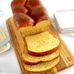 Keto Brioche Bread on cutting board with a few slices