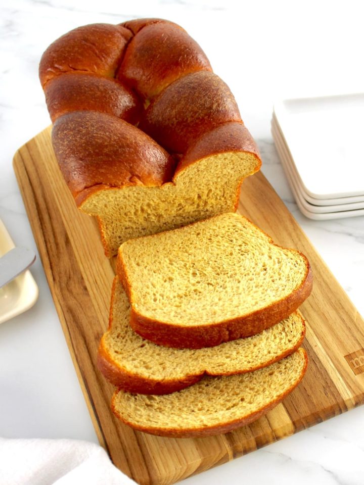 Keto Brioche Bread on cutting board with a few slices