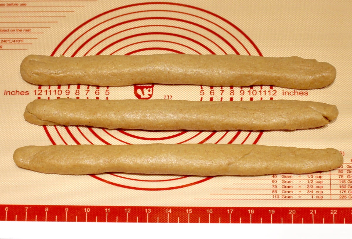 3 ropes of Keto Brioche Bread dough on Silpat
