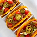 Keto Cheese Tacos on metal taco holder