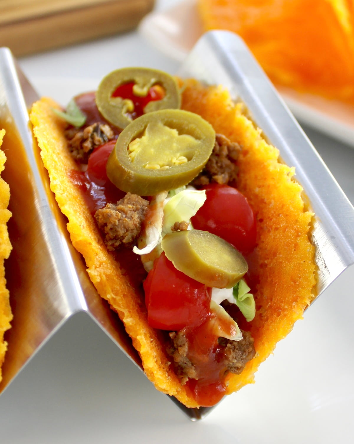 closeup of Keto Cheese Taco in metal taco holder