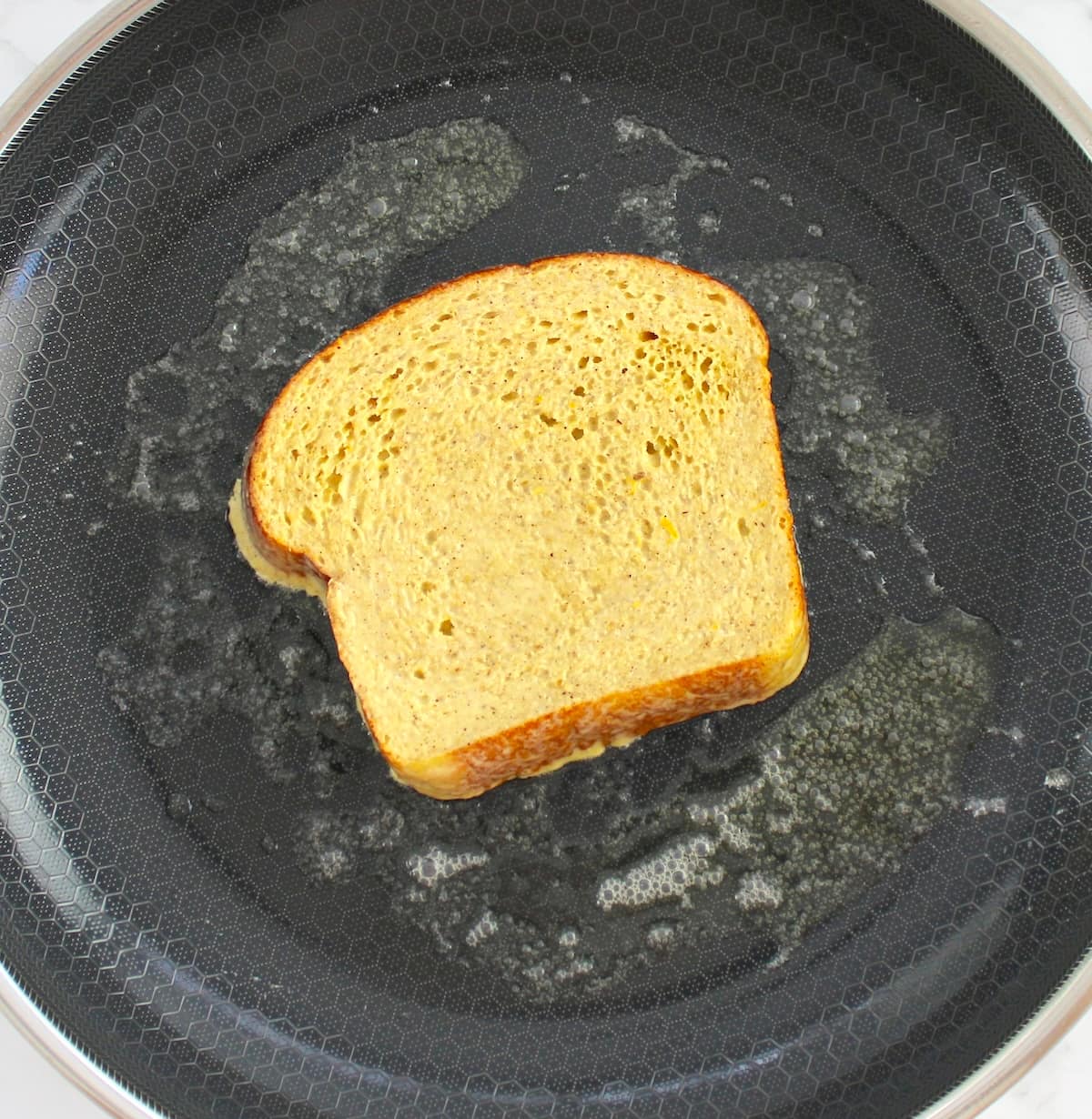 french toast cooking in skillet