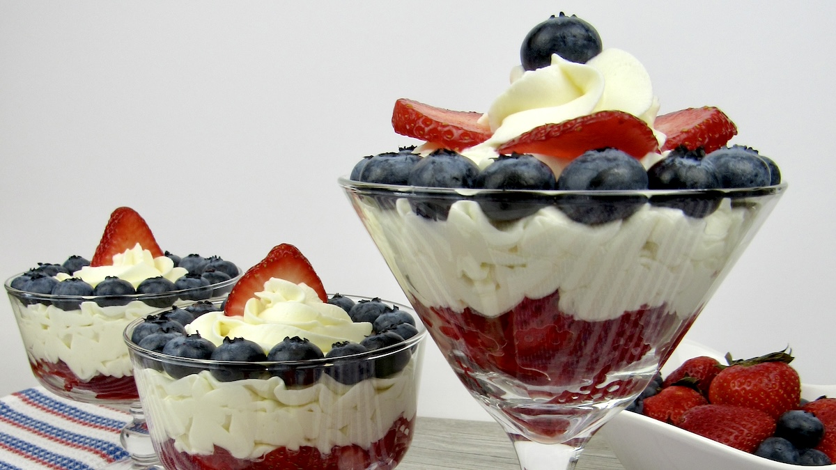 cheesecake mousse in glasses with berries on top