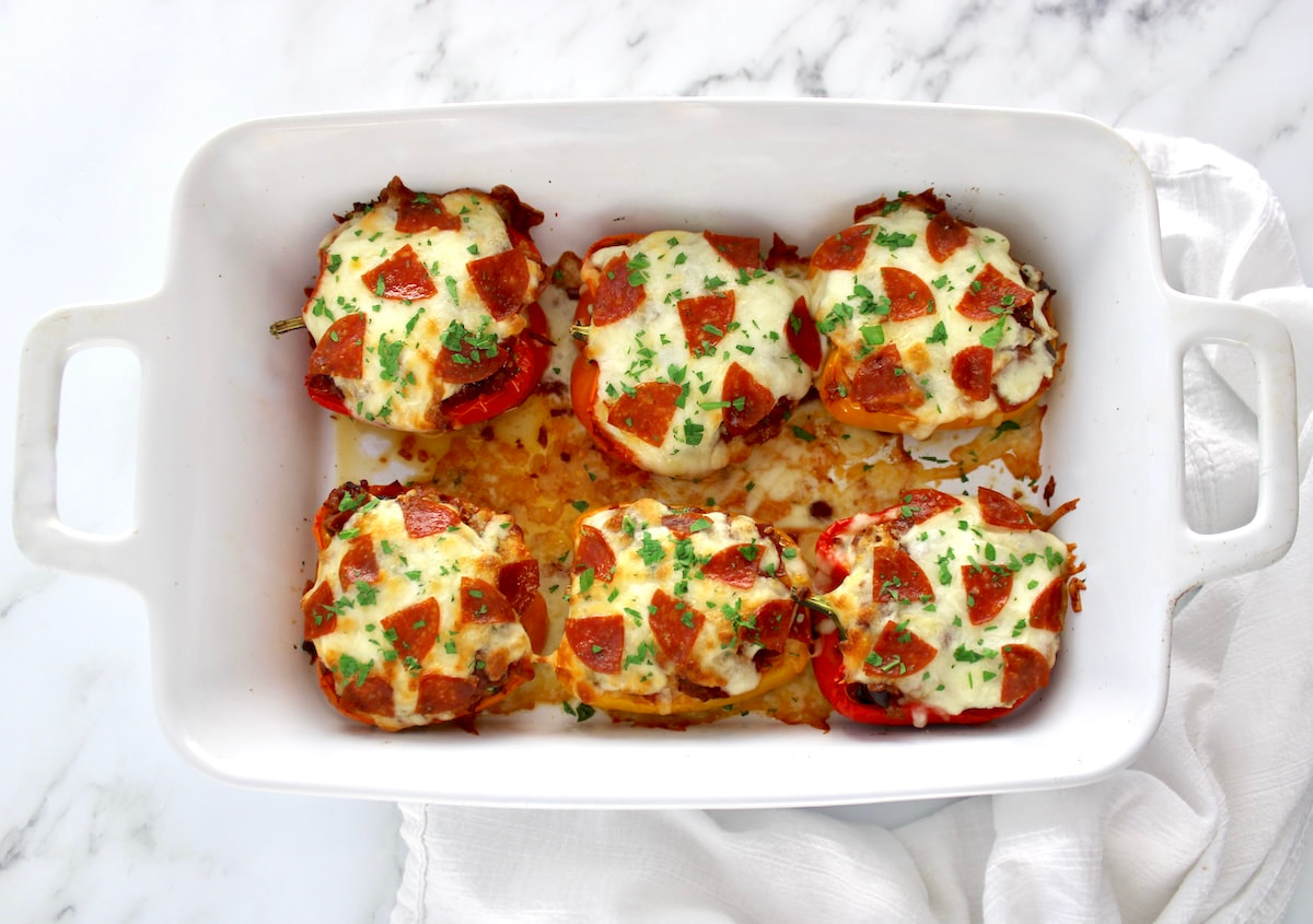 Pizza Stuffed Peppers in white casserole
