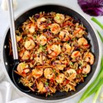 Shrimp Egg Roll in a Bowl in a skillet with serving spoon