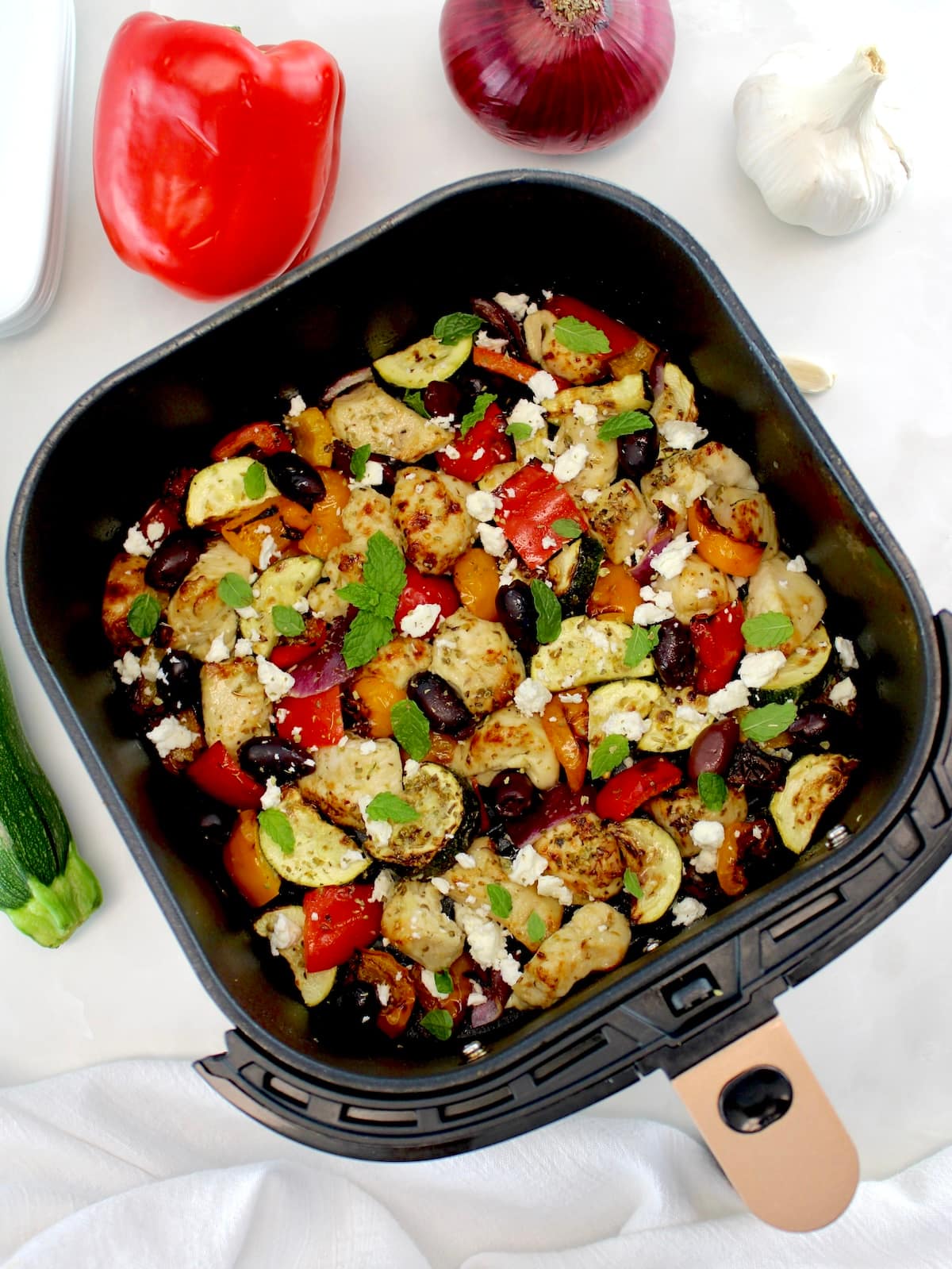 Air Fryer Greek Chicken Bites in air fryer basket
