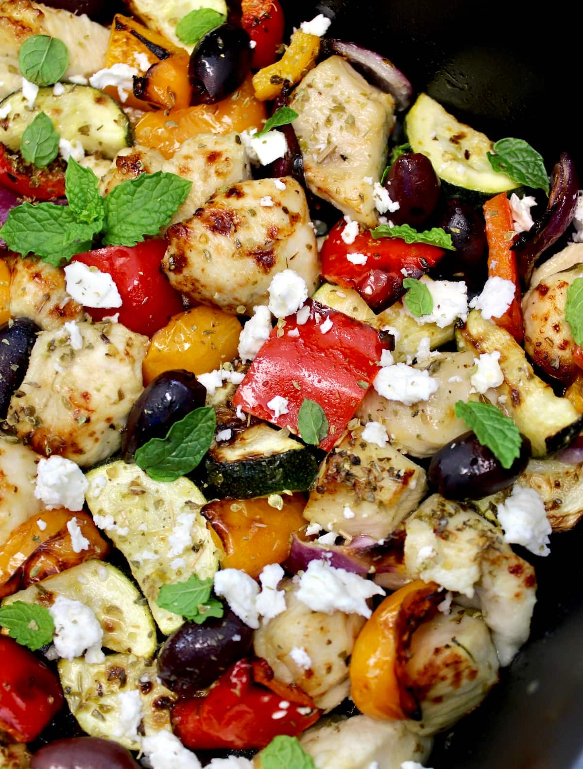 closeup of Air Fryer Greek Chicken Bites in air fryer basket