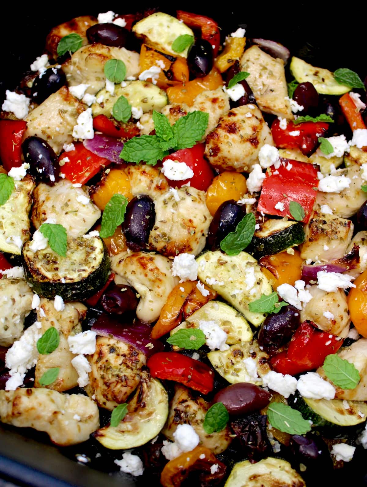 closesup of Air Fryer Greek Chicken Bites in air fryer basket