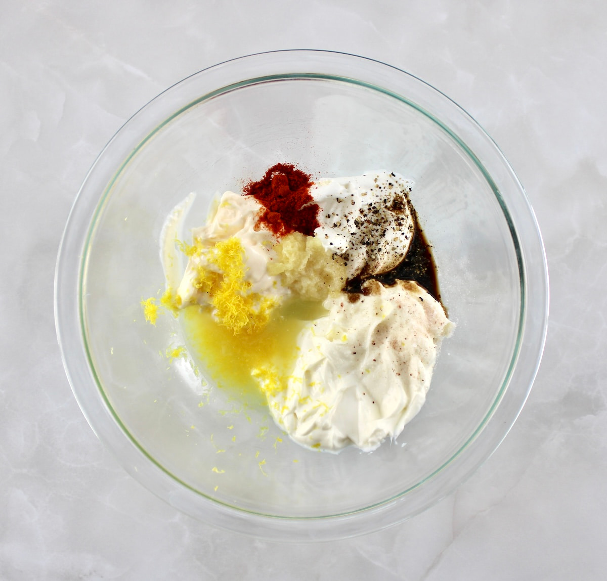 Cold Crab Dip dressing ingredients in glass bowl unmixed