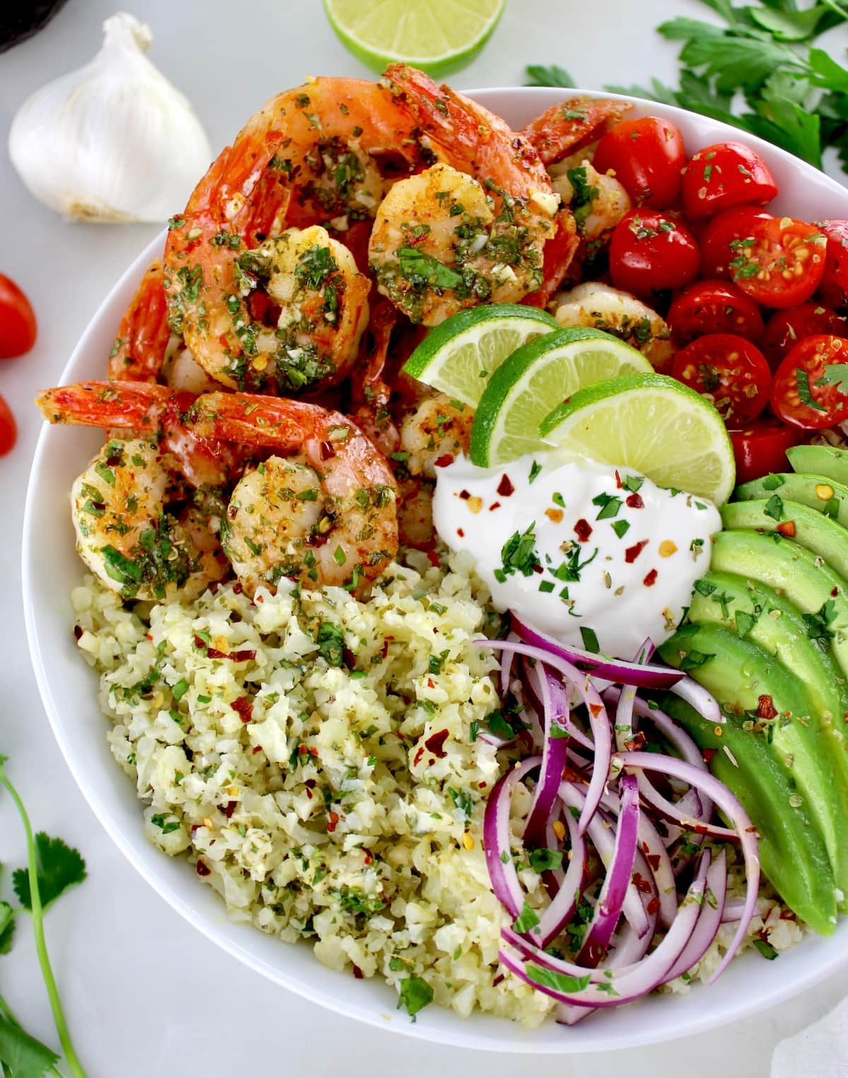 closeup of Chimichurri Shrimp Avocado Bowl in white bowl
