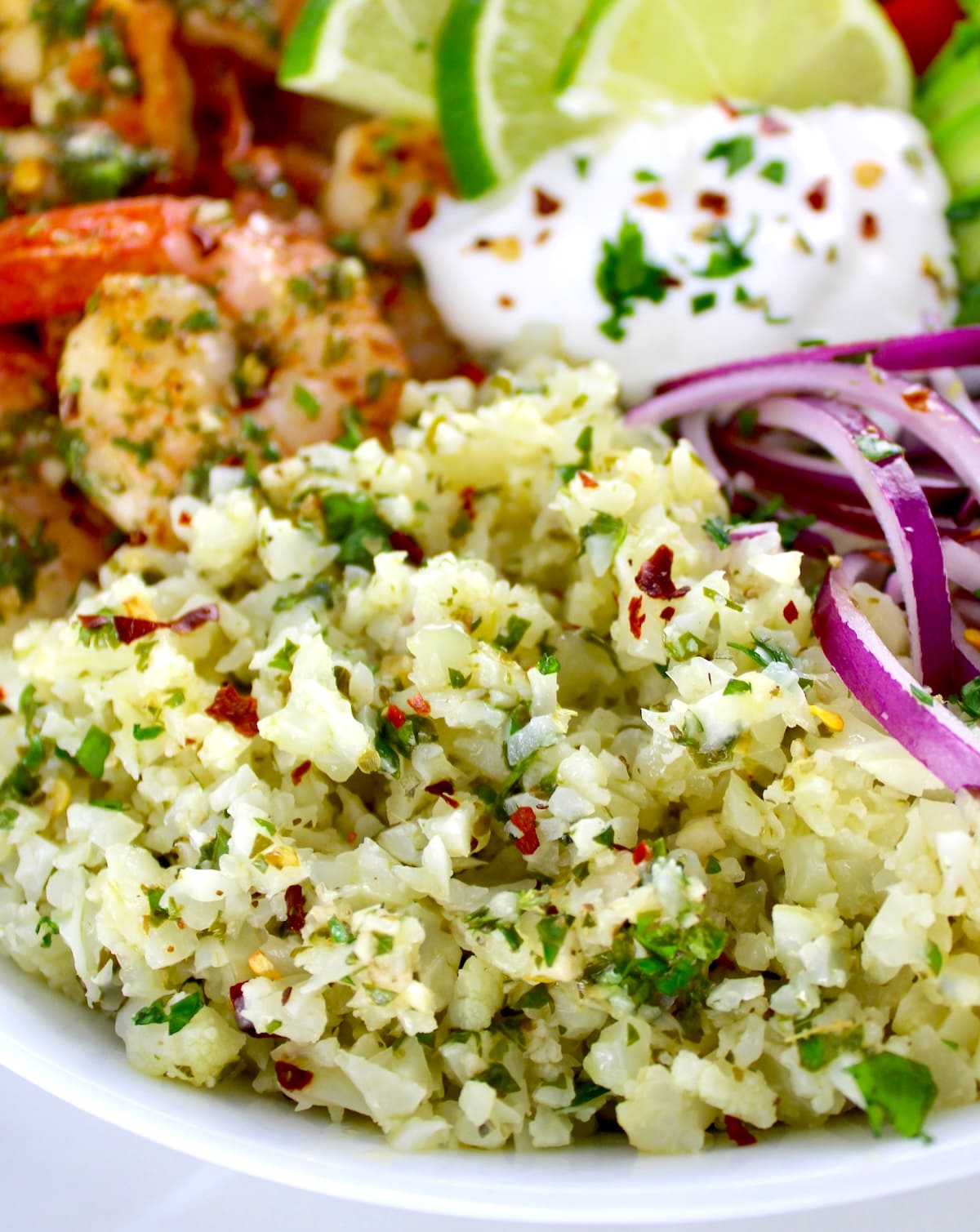 closeup of chimichurri cauliflower rice in bowl