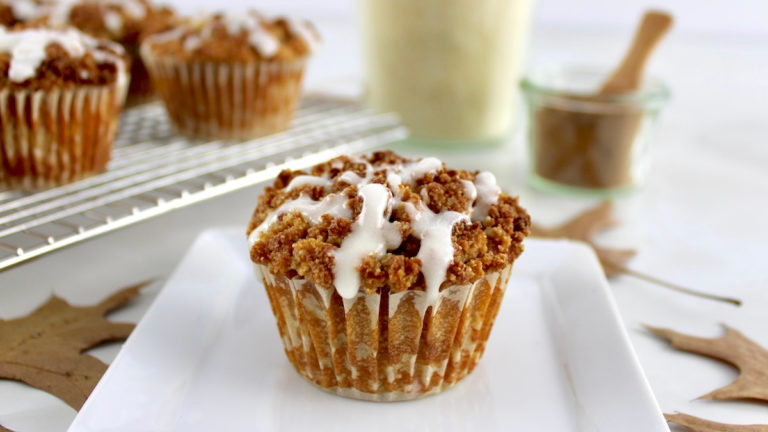 Keto Pumpkin Coffee Cake Muffin on white plate with more in back