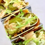 Keto Smash Burger Tacos in metal taco holder