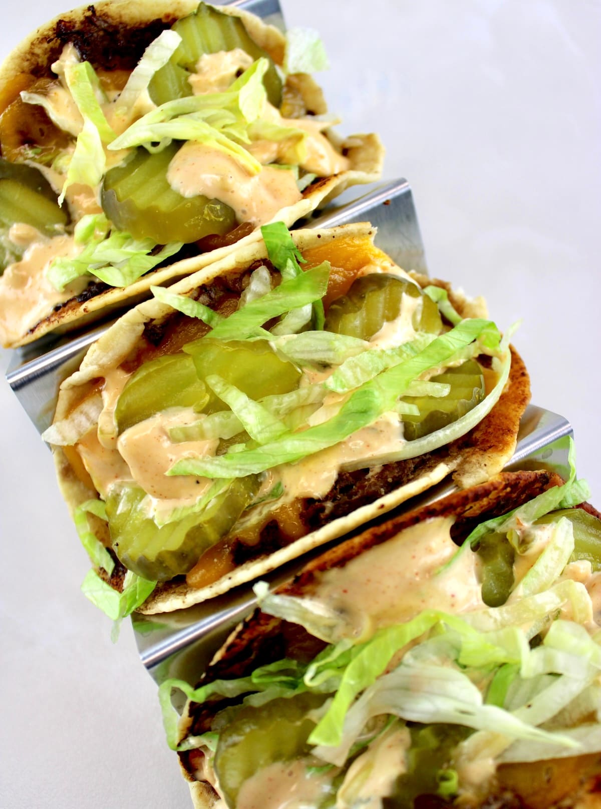 Keto Smash Burger Tacos in metal taco holder