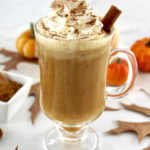 Pumpkin Spiced Bulletproof Coffee in glass mug with whip cream on top
