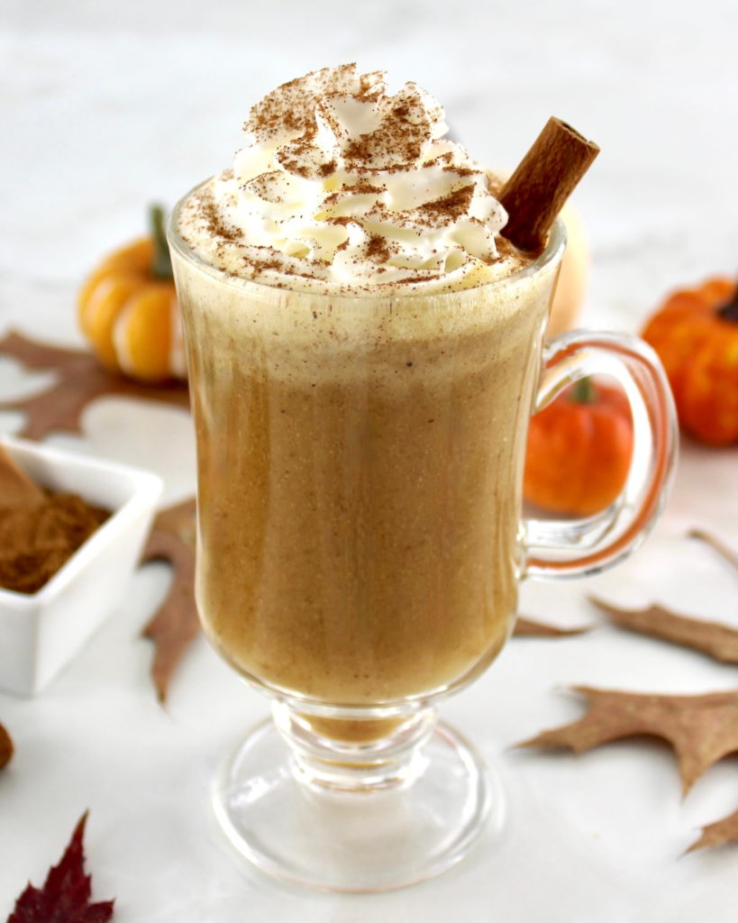 Pumpkin Spiced Bulletproof Coffee in glass mug with whip cream on top
