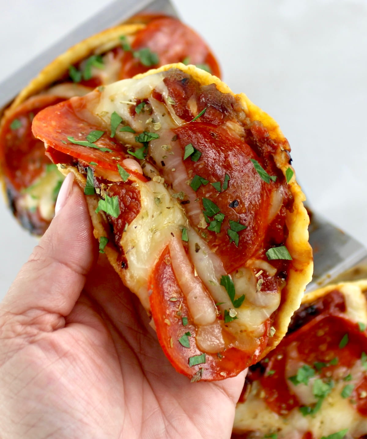 holding Smash Burger Pizza Taco