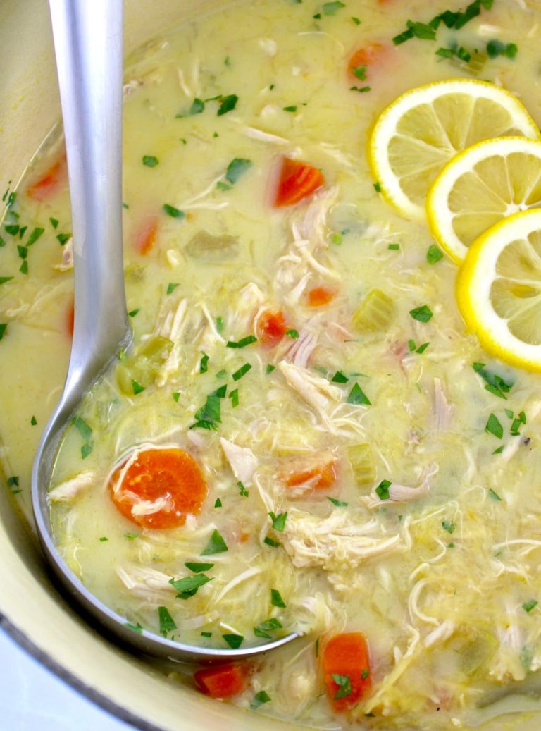 closeup of Avgolemono Soup in pot with ladle on side